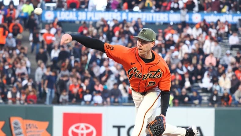 May 19, 2023; San Francisco, California, USA; San Francisco Giants starting pitcher Anthony DeSclafani (26) pitches the ball against the Miami Marlins during the first inning at Oracle Park. Mandatory Credit: Kelley L Cox-USA TODAY Sports