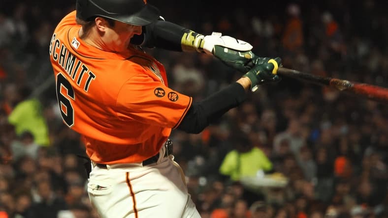 May 19, 2023; San Francisco, California, USA; San Francisco Giants third baseman Casey Schmitt (6) hits an RBI single against the Miami Marlins during the sixth inning at Oracle Park. Mandatory Credit: Kelley L Cox-USA TODAY Sports