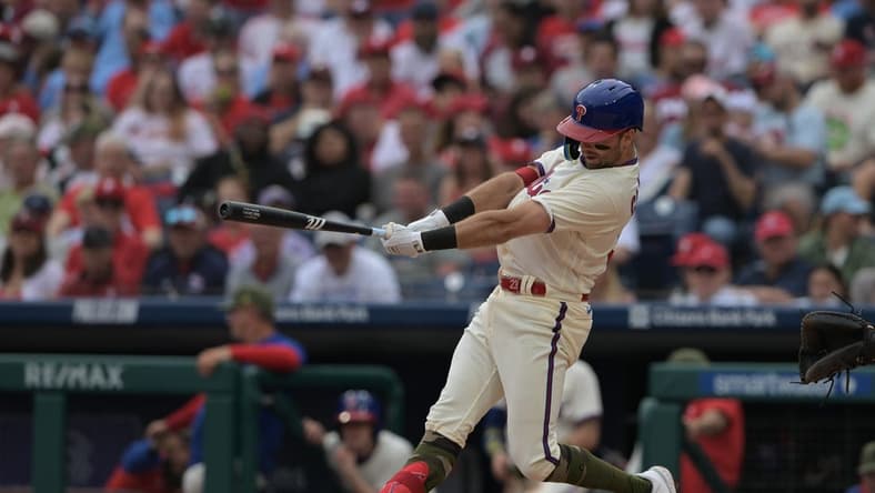May 20, 2023; Philadelphia, Pennsylvania, USA;  Philadelphia Phillies first baseman Kody Clemens (23) hits a solo home run during the first inning of the game against the Chicago Cubs at Citizens Bank Park. Mandatory Credit: John Geliebter-USA TODAY Sports