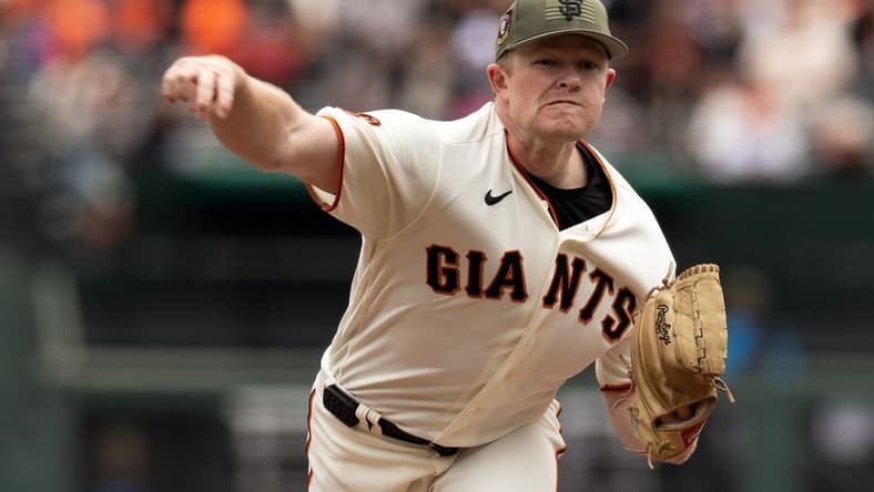 May 20, 2023; San Francisco, California, USA; San Francisco Giants starting pitcher Logan Webb (62) delivers a pitch against the Miami Marlins during the first inning at Oracle Park. Mandatory Credit: D. Ross Cameron-USA TODAY Sports