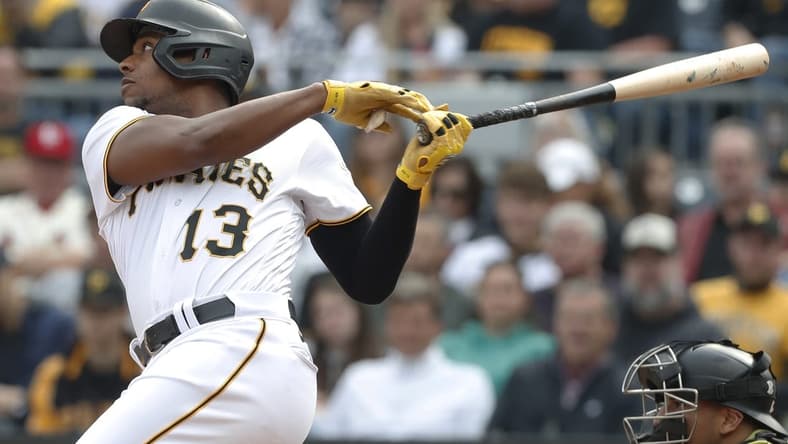 May 20, 2023; Pittsburgh, Pennsylvania, USA; Pittsburgh Pirates third baseman Ke'Bryan Hayes (13) hits a three run triple against the Arizona Diamondbacks during the third inning at PNC Park. Mandatory Credit: Charles LeClaire-USA TODAY Sports