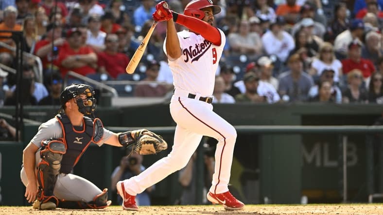 May 20, 2023; Washington, District of Columbia, USA; Washington Nationals third baseman Jeimer Candelario (9) hits a solo home run against the Detroit Tigers dfourth inning at Nationals Park. Mandatory Credit: Brad Mills-USA TODAY Sports