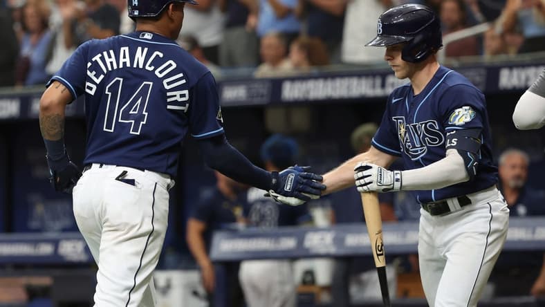 May 20, 2023; St. Petersburg, Florida, USA;  Tampa Bay Rays catcher Christian Bethancourt (14) is congratulated after hitting a home run during the fourth inning against the Milwaukee Brewers at Tropicana Field. Mandatory Credit: Kim Klement-USA TODAY Sports
