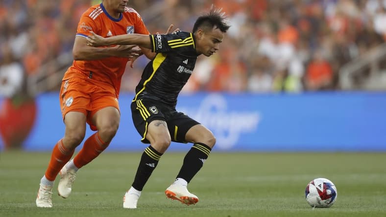 May 20, 2023; Cincinnati, Ohio, USA; FC Cincinnati defender Nick Hagglund (4) battles for the ball against Columbus Crew midfielder Lucas Zelarrayan (10) at TQL Stadium. Mandatory Credit: Katie Stratman-USA TODAY Sports