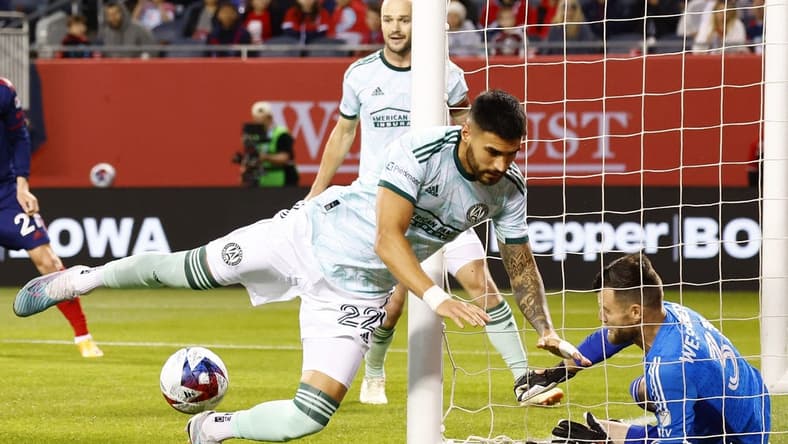 May 20, 2023; Chicago, Illinois, USA; Chicago Fire midfielder Xherdan Shaqiri (not pictured) scores a goal against Atlanta United defender Juan Sanchez (22) and goalkeeper Quentin Westberg (31) during the first half at Soldier Field. Mandatory Credit: Mike Dinovo-USA TODAY Sports