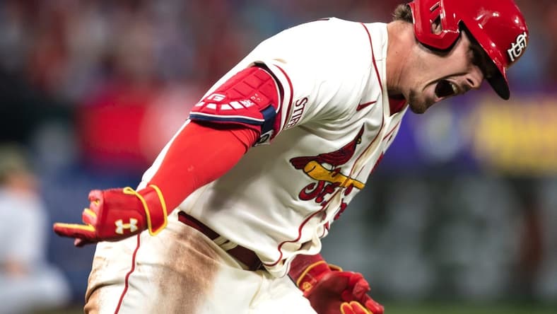 May 20, 2023; St. Louis, Missouri, USA; St. Louis Cardinals designated hitter Nolan Gorman (16) celebrates after hitting a three-run home run in the eighth inning at Busch Stadium. Mandatory Credit: Paul Halfacre-USA TODAY Sports