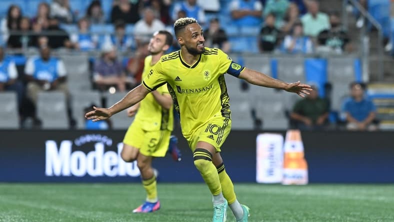 May 20, 2023; Charlotte, North Carolina, USA; Nashville SC midfielder Hany Mukhtar (10) celebrates his goal scored in extra time against Charlotte FC to win the game 2-1 at Bank of America Stadium. Mandatory Credit: Griffin Zetterberg-USA TODAY Sports
