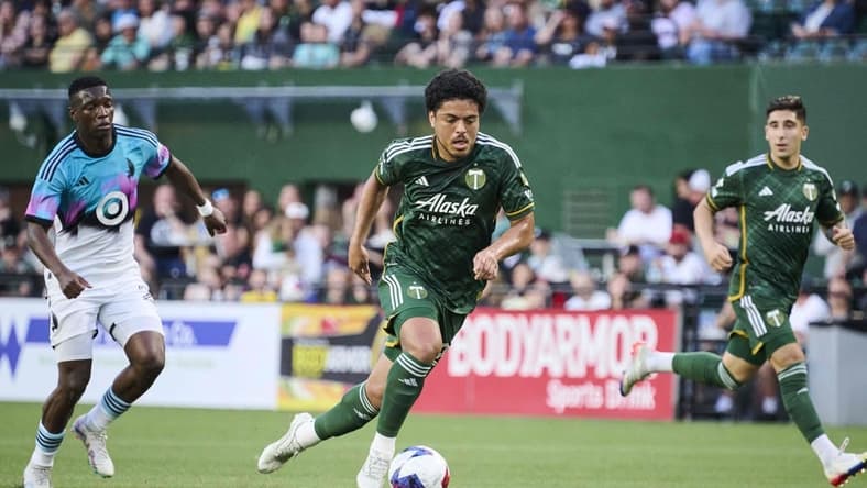 May 20, 2023; Portland, Oregon, USA; Portland Timbers midfielder Evander (20) controls a pass during the first half against Minnesota United at Providence Park. Mandatory Credit: Troy Wayrynen-USA TODAY Sports