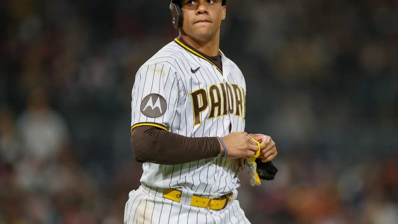 May 20, 2023; San Diego, California, USA; San Diego Padres left fielder Juan Soto (22) walks to first base after drawing a walk in the ninth inning against the Boston Red Sox at Petco Park. Mandatory Credit: David Frerker-USA TODAY Sports