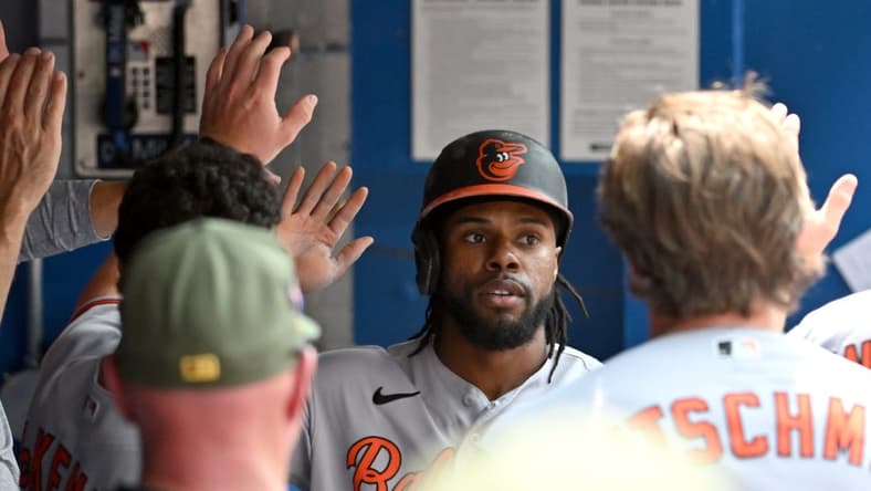 May 21, 2023; Toronto, Ontario, CAN;  Baltimore Orioles center fielder Cedric Mullins (31) celebrates after scoring against the Toronto Blue Jays in the third inning at Rogers Centre. Mandatory Credit: Dan Hamilton-USA TODAY Sports