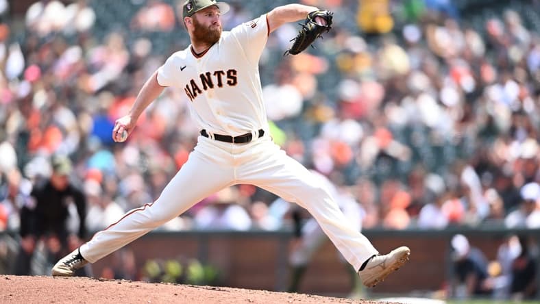 May 21, 2023; San Francisco, California, USA; San Francisco Giants pitcher John Brebbia (59) throws a pitch against the Miami Marlins during the fourth inning at Oracle Park. Mandatory Credit: Robert Edwards-USA TODAY Sports