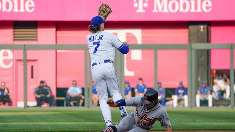 May 22, 2023; Kansas City, Missouri, USA; Kansas City Royals shortstop Bobby Witt Jr. (7) can t make the tag as Detroit Tigers second baseman Zach McKinstry (39) reaches second base in the first inning at Kauffman Stadium. Mandatory Credit: Denny Medley-USA TODAY Sports
