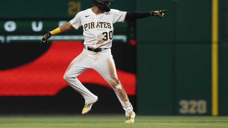 May 22, 2023; Pittsburgh, Pennsylvania, USA; Pittsburgh Pirates shortstop Tucupita Marcano (30) reacts as he circles the bases on a grand slam home run against the Texas Rangers during the seventh inning at PNC Park. Mandatory Credit: Charles LeClaire-USA TODAY Sports