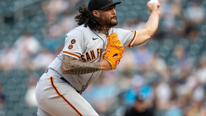 May 22, 2023; Minneapolis, Minnesota, USA; San Francisco Giants relief pitcher Sean Manaea (52) delivers a pitch in the third inning against the Minnesota Twins at Target Field. Mandatory Credit: Jesse Johnson-USA TODAY Sports