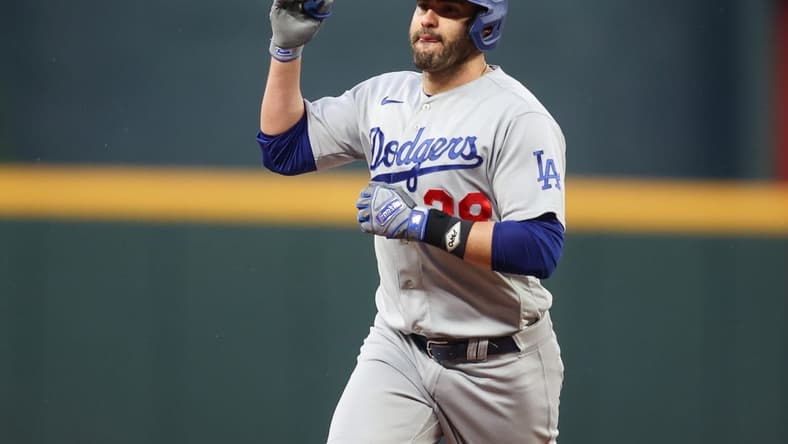 May 22, 2023; Atlanta, Georgia, USA; Los Angeles Dodgers designated hitter J.D. Martinez (28) reacts after a home run against the Atlanta Braves in the second inning at Truist Park. Mandatory Credit: Brett Davis-USA TODAY Sports