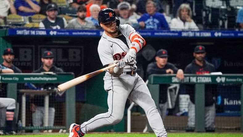 May 22, 2023; Kansas City, Missouri, USA; Detroit Tigers shortstop Javier Baez (28) hits a two-run double against the Kansas City Royals in the tenth inning at Kauffman Stadium. Mandatory Credit: Denny Medley-USA TODAY Sports