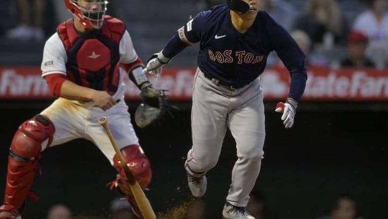May 22, 2023; Anaheim, California, USA; Boston Red Sox left fielder Masataka Yoshida (7) singles in a run in the sixth inning against the Los Angeles Angels at Angel Stadium. Mandatory Credit: Jayne Kamin-Oncea-USA TODAY Sports