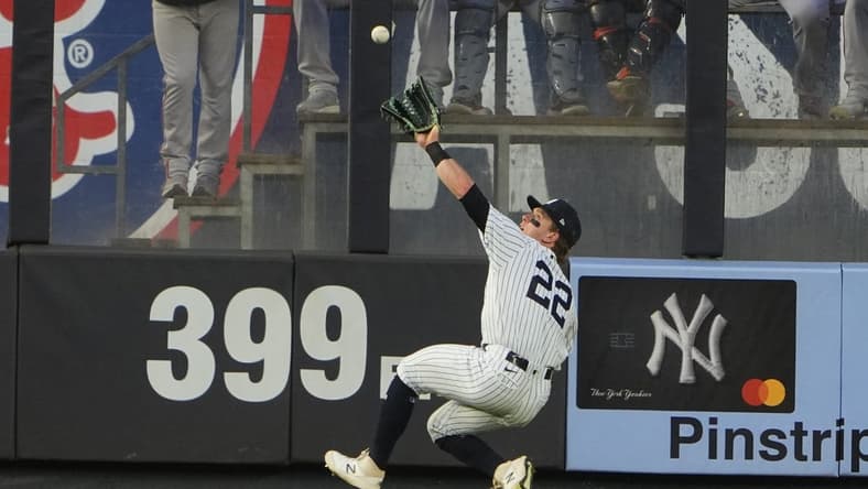 May 23, 2023; Bronx, New York, USA; New York Yankees center fielder Harrison Bader (22) catches a fly ball hit by Baltimore Orioles designted hitter Anthony Santander (25) (not pictured) during the third inning at Yankee Stadium. Mandatory Credit: Gregory Fisher-USA TODAY Sports
