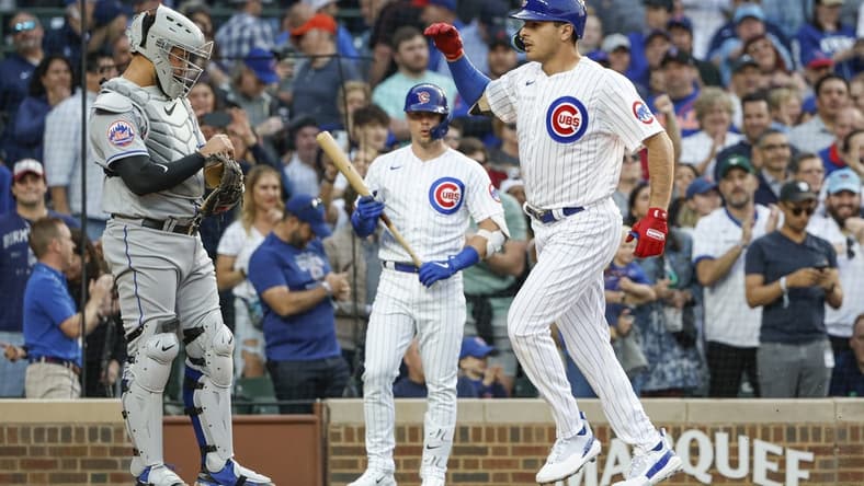 May 23, 2023; Chicago, Illinois, USA; Chicago Cubs first baseman Matt Mervis (22) crosses home plate after hitting a two-run home run against the New York Mets during the second inning at Wrigley Field. Mandatory Credit: Kamil Krzaczynski-USA TODAY Sports