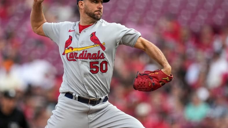 St. Louis Cardinals starting pitcher Adam Wainwright (50) throws a pitch in the second inning of the MLB National League game between the Cincinnati Reds and the St. Louis Cardinals at Great American Ball Park in downtown Cincinnati on Tuesday, May 23, 2023. The Cardinals led 7-4 in the sixth inning.