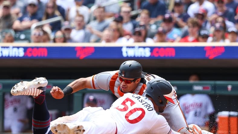 May 24, 2023; Minneapolis, Minnesota, USA; Minnesota Twins left fielder Willi Castro (50) steals home against San Francisco Giants catcher Blake Sabol (2) during the third inning at Target Field. Mandatory Credit: Matt Krohn-USA TODAY Sports