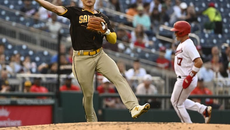 May 24, 2023; Washington, District of Columbia, USA; San Diego Padres third baseman Ha-Seong Kim (7) throws out Washington Nationals right fielder Lane Thomas (not shown) during the second inning at Nationals Park. Mandatory Credit: Brad Mills-USA TODAY Sports