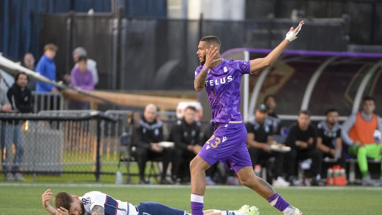 May 24, 2023; Langford, British Columbia, CAN;  Vancouver Whitecaps FC defender Tristan Blackmon (6) battles for the ball against Pacific FC forward Djenairo Daniels (23) during the second half at Starlight Stadium. Mandatory Credit: Anne-Marie Sorvin-USA TODAY Sports