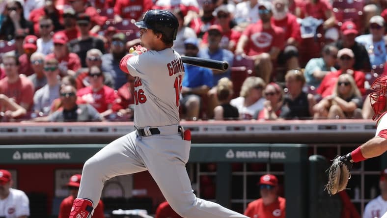May 25, 2023; Cincinnati, Ohio, USA; St. Louis Cardinals designated hitter Nolan Gorman (16) hits an RBI double against the Cincinnati Reds during the eighth inning at Great American Ball Park. Mandatory Credit: David Kohl-USA TODAY Sports