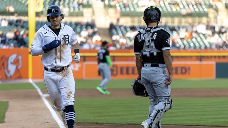 May 25, 2023; Detroit, Michigan, USA; Detroit Tigers second baseman Zach McKinstry (39) scores a run against the Chicago White Sox in the fourth inning at Comerica Park. Mandatory Credit: David Reginek-USA TODAY Sports