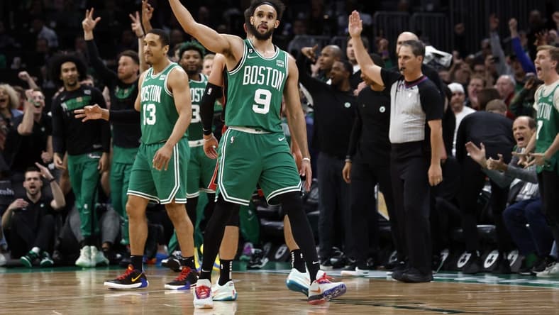 May 25, 2023; Boston, Massachusetts, USA; Boston Celtics guard Derrick White (9) reacts during the second quarter of game five against the Miami Heat in the Eastern Conference Finals for the 2023 NBA playoffs at TD Garden. Mandatory Credit: Winslow Townson-USA TODAY Sports