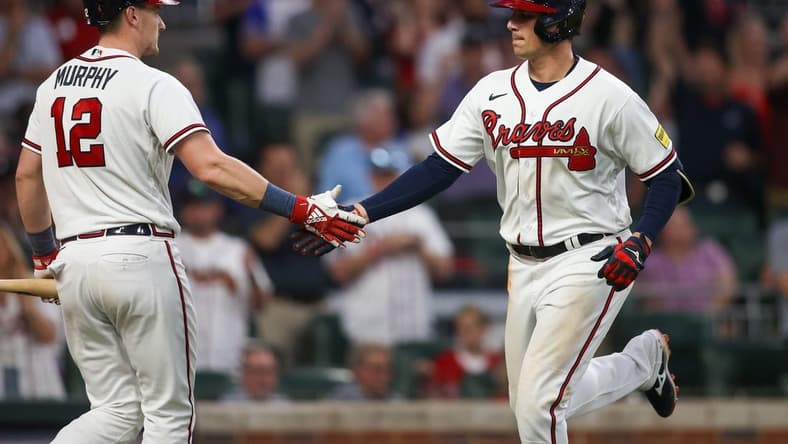 May 25, 2023; Atlanta, Georgia, USA; Atlanta Braves third baseman Austin Riley (27) celebrates with catcher Sean Murphy (12) after a home run against the Philadelphia Phillies in the fifth inning at Truist Park. Mandatory Credit: Brett Davis-USA TODAY Sports