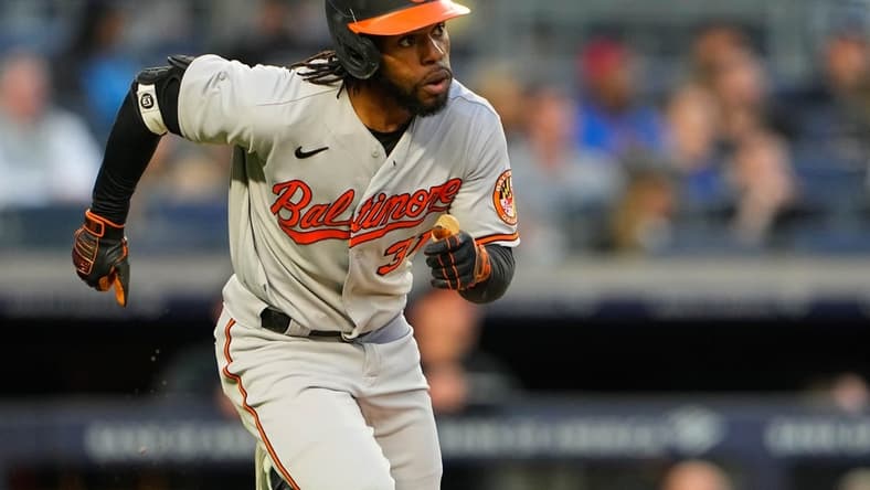 May 23, 2023; Bronx, New York, USA; Baltimore Orioles center fielder Cedric Mullins (31) watches his home run against the New York Yankees during the third inning at Yankee Stadium. Mandatory Credit: Gregory Fisher-USA TODAY Sports