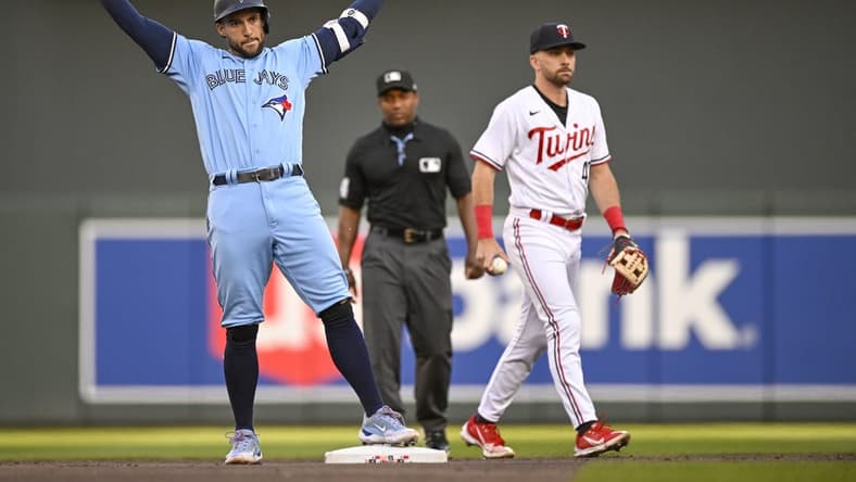 May 26, 2023; Minneapolis, Minnesota, USA; Toronto Blue Jays outfielder George Springer (4) celebrates his double against the Minnesota Twins during the first inning at Target Field. Mandatory Credit: Nick Wosika-USA TODAY Sports