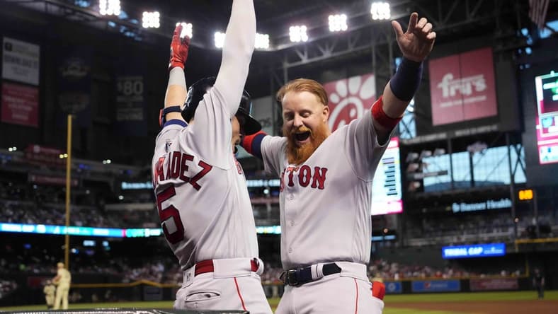 May 26, 2023; Phoenix, Arizona, USA; Boston Red Sox shortstop Enrique Hernandez (5) celebrates with Boston Red Sox third baseman Justin Turner (2) after hitting a two run home run against the Arizona Diamondbacks during the third inning at Chase Field. Mandatory Credit: Joe Camporeale-USA TODAY Sports
