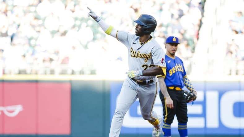May 26, 2023; Seattle, Washington, USA; Pittsburgh Pirates designated hitter Andrew McCutchen (22) celebrates while running the bases after hitting a solo-home run against the Seattle Mariners during the first inning at T-Mobile Park. Mandatory Credit: Joe Nicholson-USA TODAY Sports