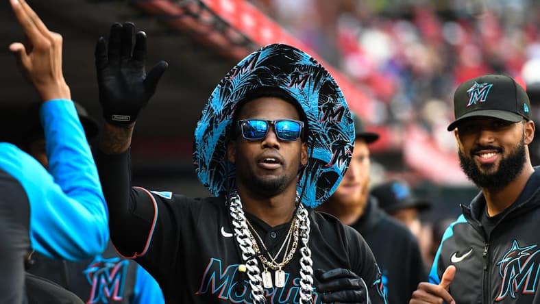 May 26, 2023; Anaheim, California, USA; Miami Marlins designated hitter Jorge Soler (12) celebrates with teammates in the dugout after hitting a home run against the Los Angeles Angels during the third inning at Angel Stadium. Mandatory Credit: Jonathan Hui-USA TODAY Sports