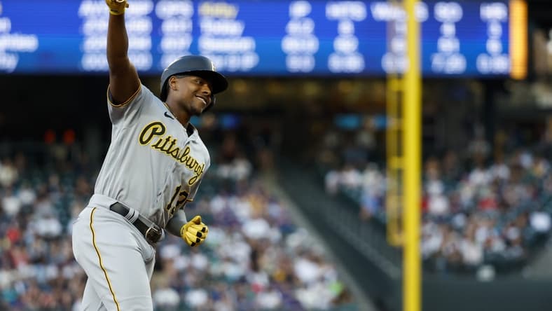 May 26, 2023; Seattle, Washington, USA; Pittsburgh Pirates third baseman Ke'Bryan Hayes (13) celebrates after hitting a solo-home run against the Seattle Mariners during the fifth inning at T-Mobile Park. Mandatory Credit: Joe Nicholson-USA TODAY Sports