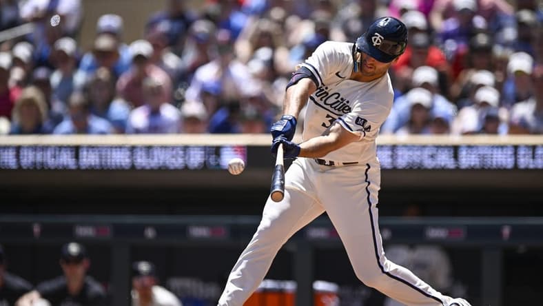 May 27, 2023; Minneapolis, Minnesota, USA;  Minnesota Twins outfielder Matt Wallner (38) drives in two runs on a single against the Toronto Blue Jays during the first inning at Target Field. Mandatory Credit: Nick Wosika-USA TODAY Sports