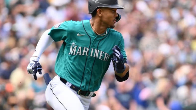 May 27, 2023; Seattle, Washington, USA; Seattle Mariners center fielder Julio Rodriguez (44) runs towards first base after hitting an RBI double against the Pittsburgh Pirates during the second inning at T-Mobile Park. Mandatory Credit: Steven Bisig-USA TODAY Sports
