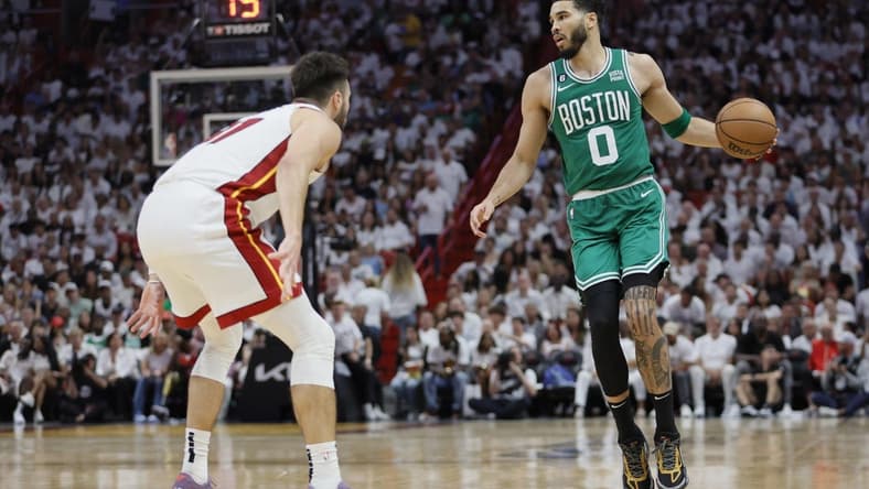 May 27, 2023; Miami, Florida, USA; Boston Celtics forward Jayson Tatum (0) controls the ball against Miami Heat guard Max Strus (31) in the third quarer during game six of the Eastern Conference Finals for the 2023 NBA playoffs at Kaseya Center. Mandatory Credit: Sam Navarro-USA TODAY Sports