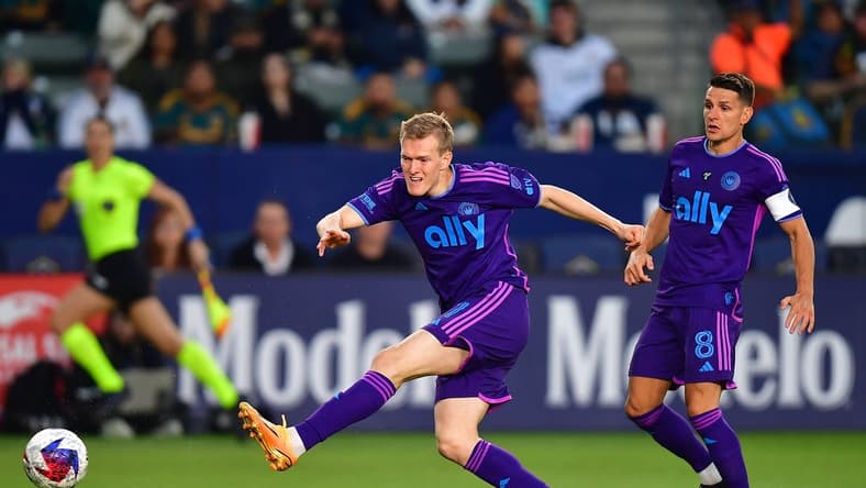 May 27, 2023; Carson, California, USA; Charlotte FC forward Karol Swiderski (11) takes a shot on goal against the Los Angeles Galaxy during the first half at Dignity Health Sports Park. Mandatory Credit: Gary A. Vasquez-USA TODAY Sports