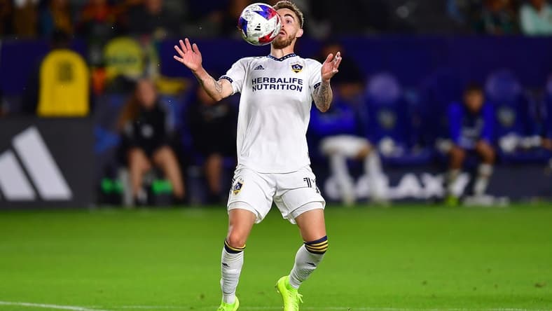 May 27, 2023; Carson, California, USA; Los Angeles Galaxy midfielder Tyler Boyd (11) controls the ball against Charlotte FC during the second half at Dignity Health Sports Park. Mandatory Credit: Gary A. Vasquez-USA TODAY Sports