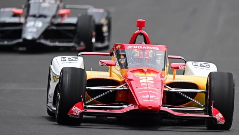 May 28, 2023; Indianapolis, Indiana, USA; Team Penske driver Josef Newgarden (2) in the first turn during the 107th running of the Indianapolis 500 at Indianapolis Motor Speedway. Mandatory Credit: Marc Lebryk-USA TODAY Sports