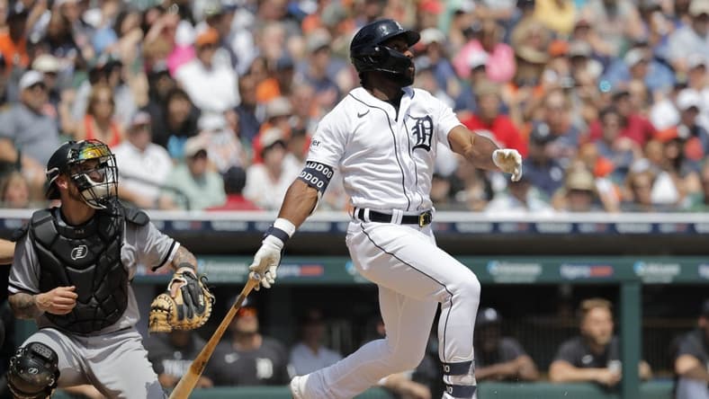 May 28, 2023; Detroit, Michigan, USA; Detroit Tigers left fielder Akil Baddoo (60) hits a grand slam in the third inning against the Chicago White Sox at Comerica Park. Mandatory Credit: Rick Osentoski-USA TODAY Sports