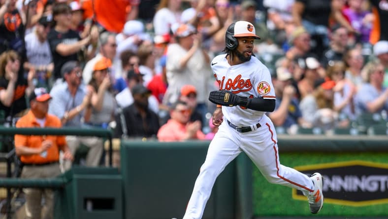 May 28, 2023; Baltimore, Maryland, USA; Baltimore Orioles center fielder Cedric Mullins (31) scores during the first inning against the Texas Rangers at Oriole Park at Camden Yards. Mandatory Credit: Reggie Hildred-USA TODAY Sports