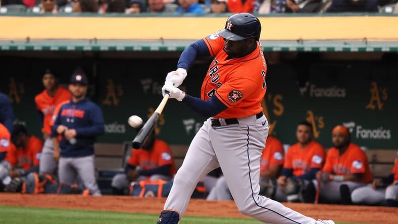 May 28, 2023; Oakland, California, USA; Houston Astros designated hitter Yordan Alvarez (44) hits a solo home run against the Oakland Athletics during the first inning at Oakland-Alameda County Coliseum. Mandatory Credit: Kelley L Cox-USA TODAY Sports