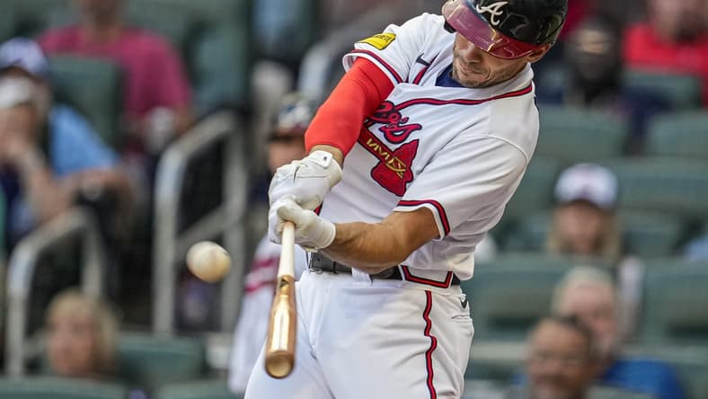 May 28, 2023; Cumberland, Georgia, USA; Atlanta Braves first baseman Matt Olson (28) hits a home run against the Philadelphia Phillies during the first inning at Truist Park. Mandatory Credit: Dale Zanine-USA TODAY Sports