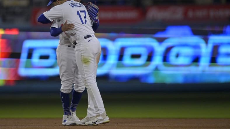 May 29, 2023; Los Angeles, California, USA; Los Angeles Dodgers right fielder Mookie Betts (50) and second baseman Miguel Vargas (17) embrace after the final out of the ninth inning defeating the Washington Nationals at Dodger Stadium. Mandatory Credit: Jayne Kamin-Oncea-USA TODAY Sports