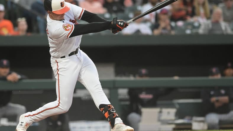 May 30, 2023; Baltimore, Maryland, USA;  Baltimore Orioles first baseman Ryan Mountcastle (6) hits a third inning single against the Cleveland Guardians at Oriole Park at Camden Yards. Mandatory Credit: Tommy Gilligan-USA TODAY Sports