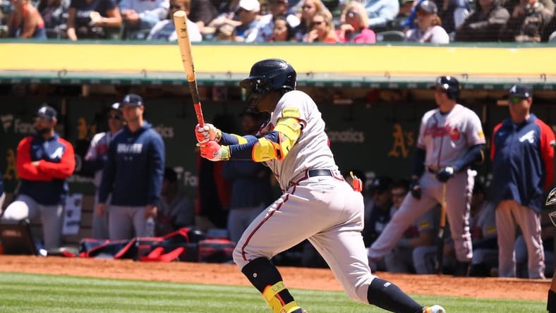 May 31, 2023; Oakland, California, USA; Atlanta Braves right fielder Ronald Acuna Jr. (13) hits an RBI-single during the seventh inning against the Oakland Athletics at Oakland-Alameda County Coliseum. Mandatory Credit: Kelley L Cox-USA TODAY Sports